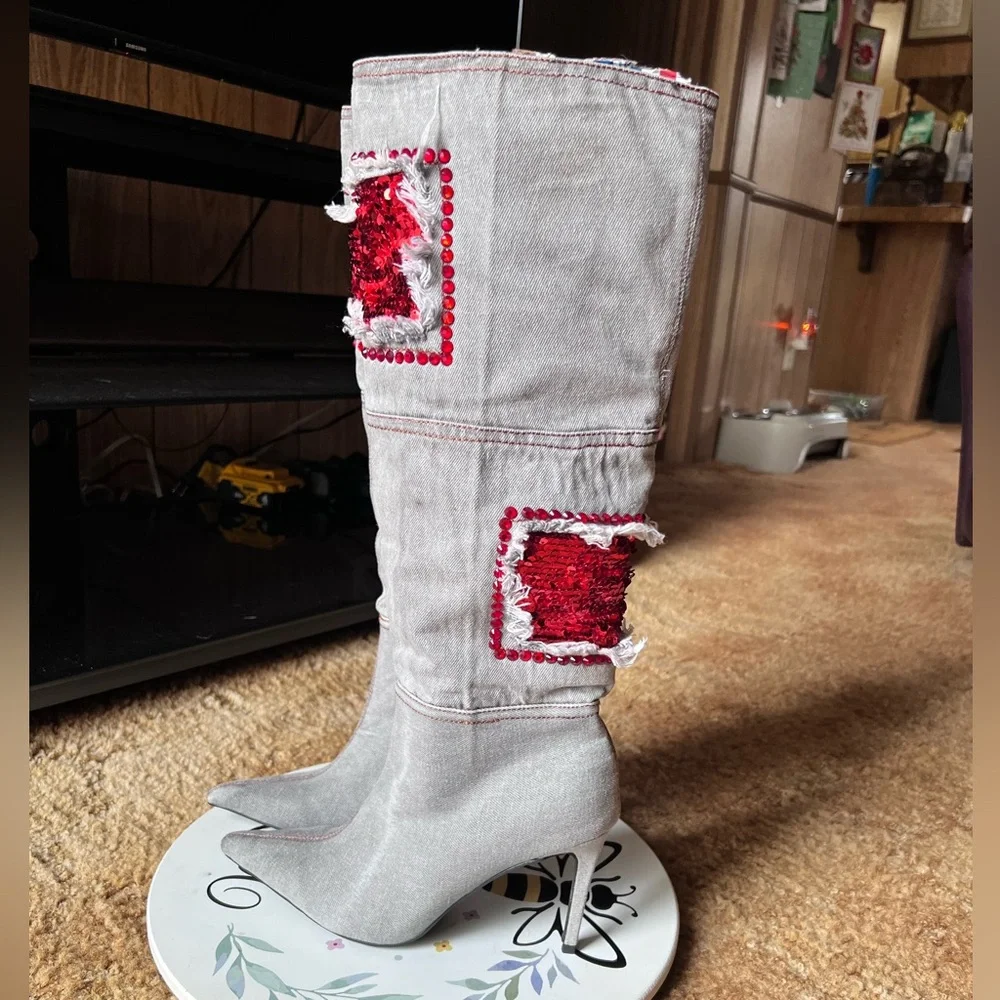 Woman’s multi-color red stone denim pointy toe knee-high boots.